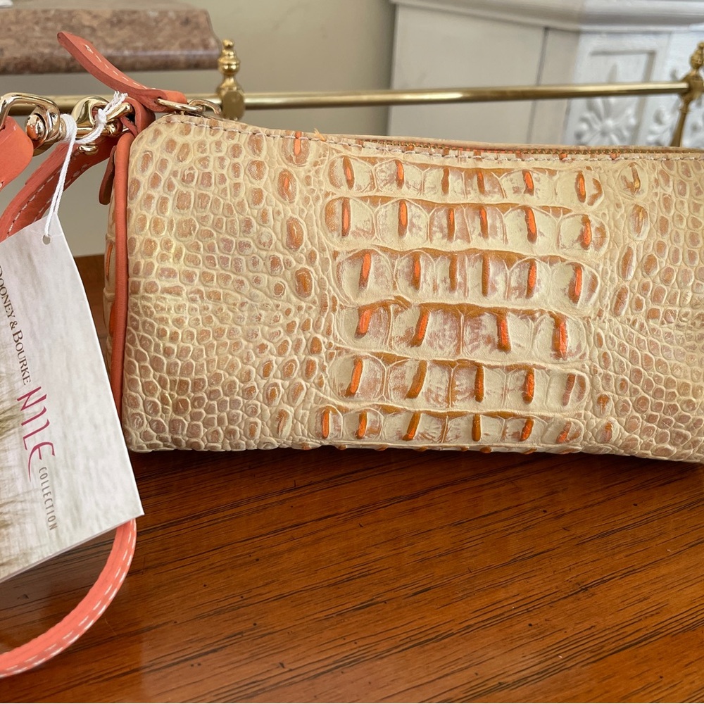 Dooney & Bourke Cream and Orange Crocodile Embossed Clutch